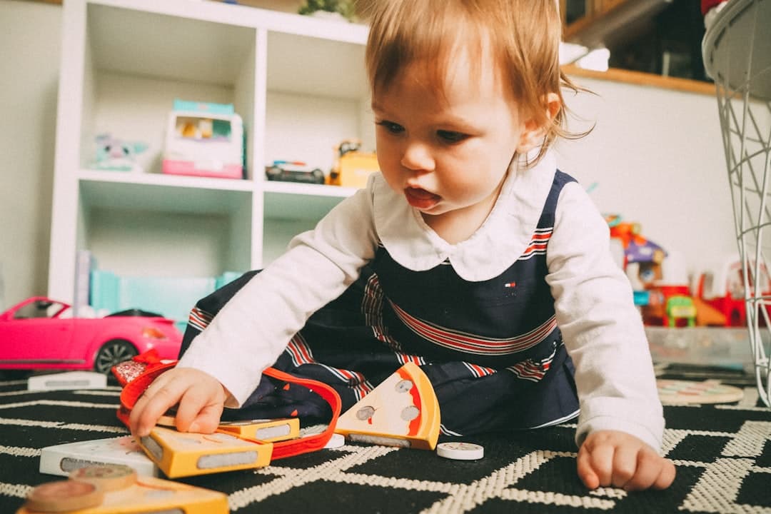 Child exploring with Montessori materials